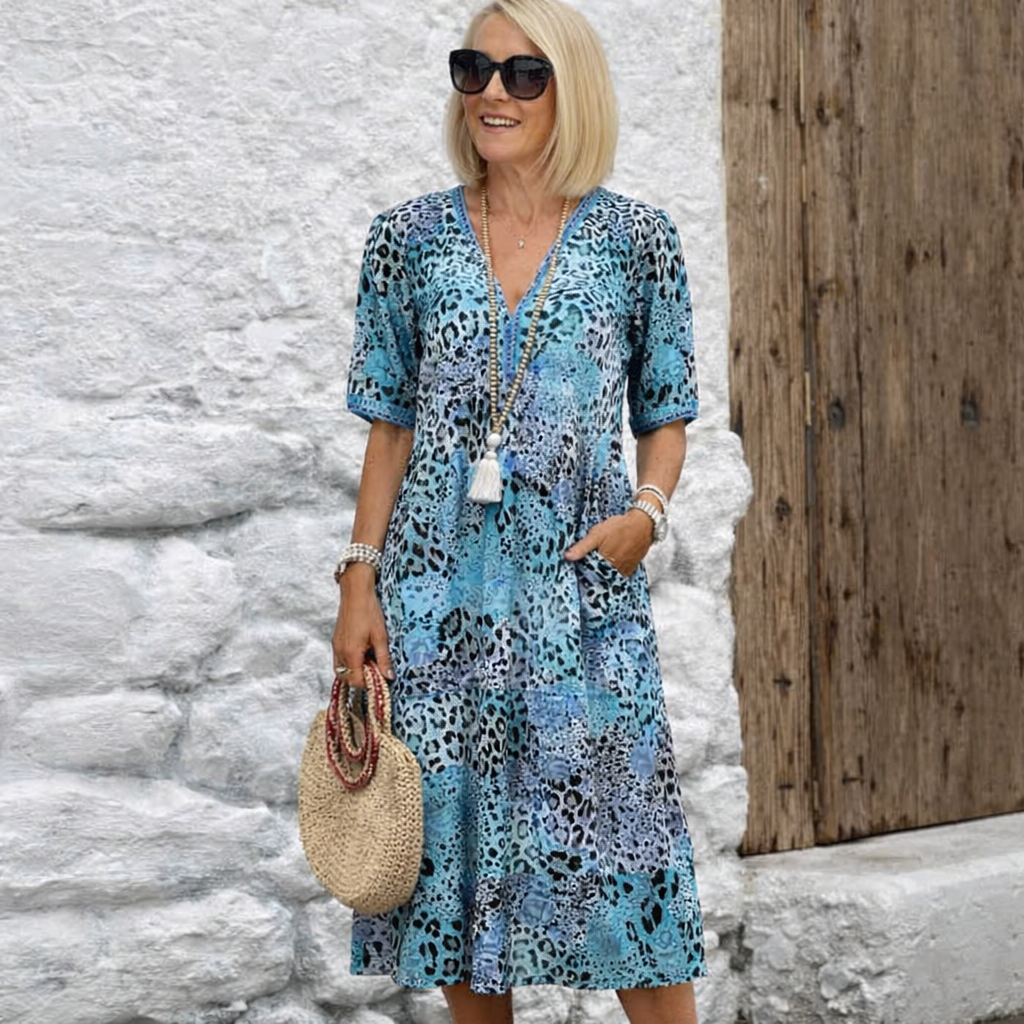 Vestido Midi Animal Print con Bolsillos y Mangas Cortas