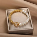 Pulsera de oro elegante con perlas