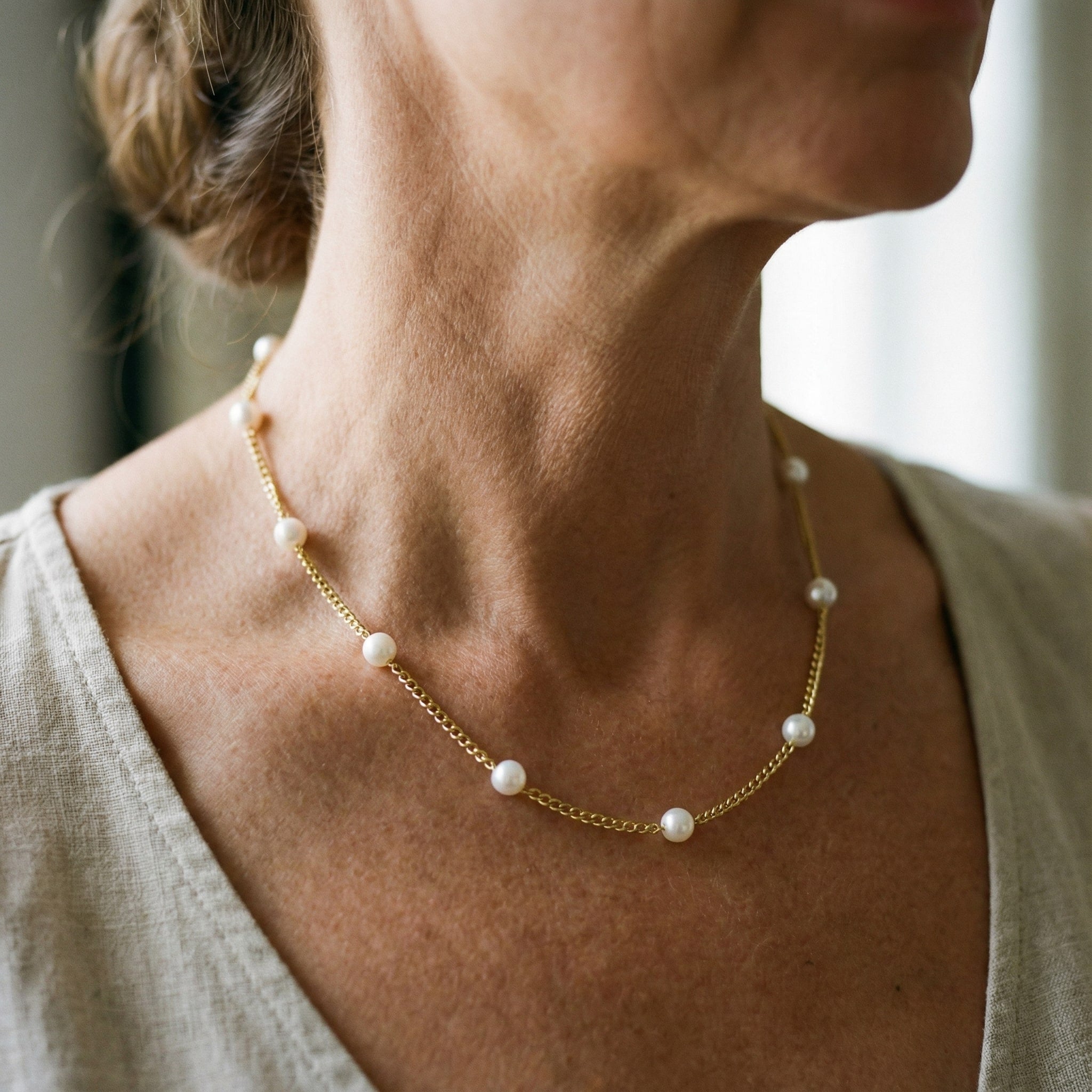 Colgante de oro con perlas de agua dulce