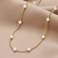 Colgante de oro con perlas de agua dulce