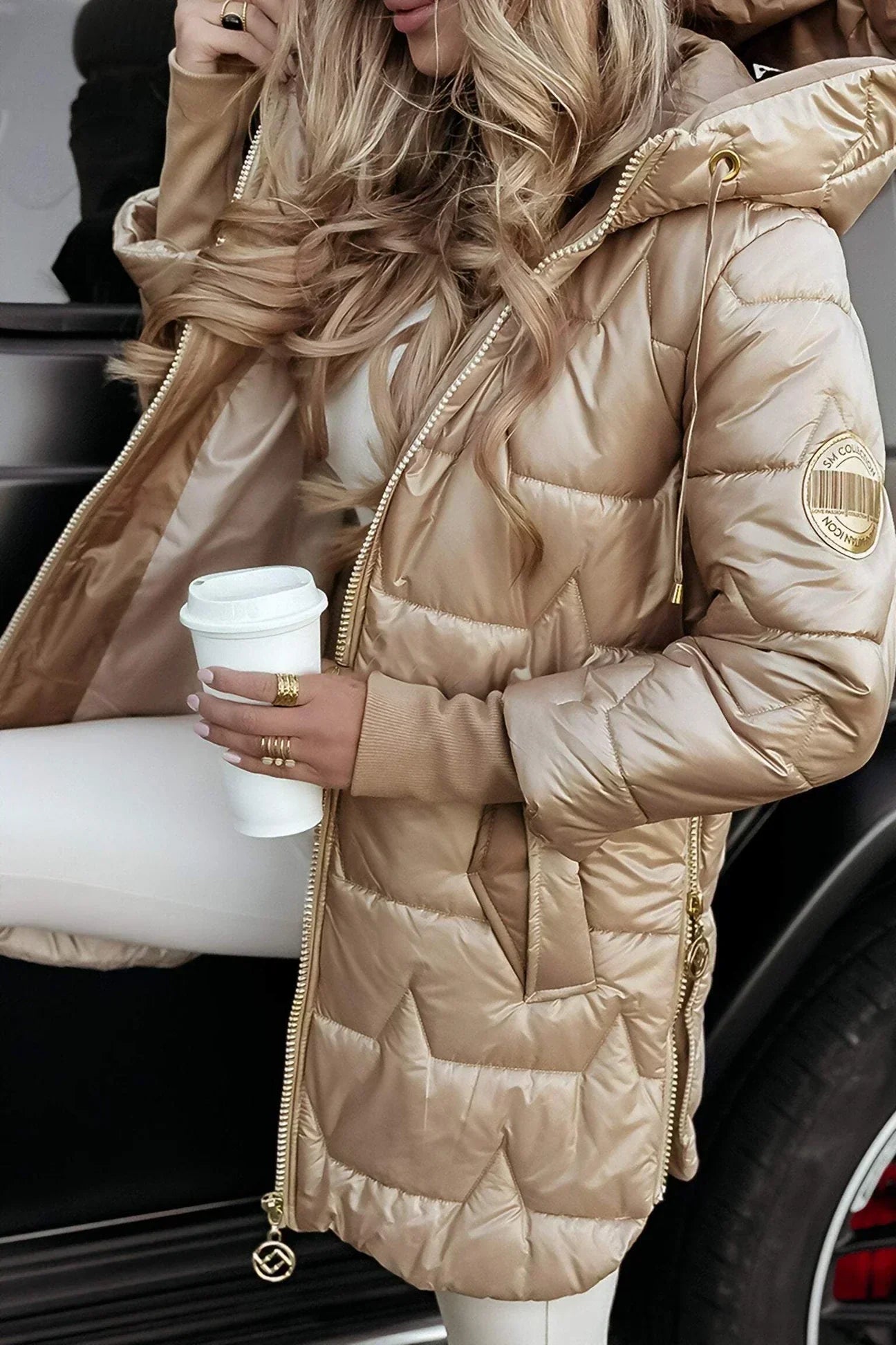 Lina | Chaqueta acolchada larga y cálida con capucha amplia