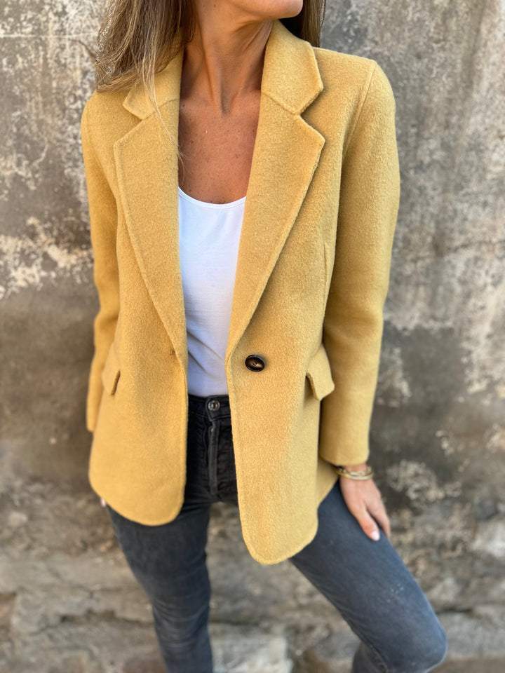 Blazer elegante texturizado para mujer con solapa de muesca, manga larga, cierre de un botón y corte de sastrería