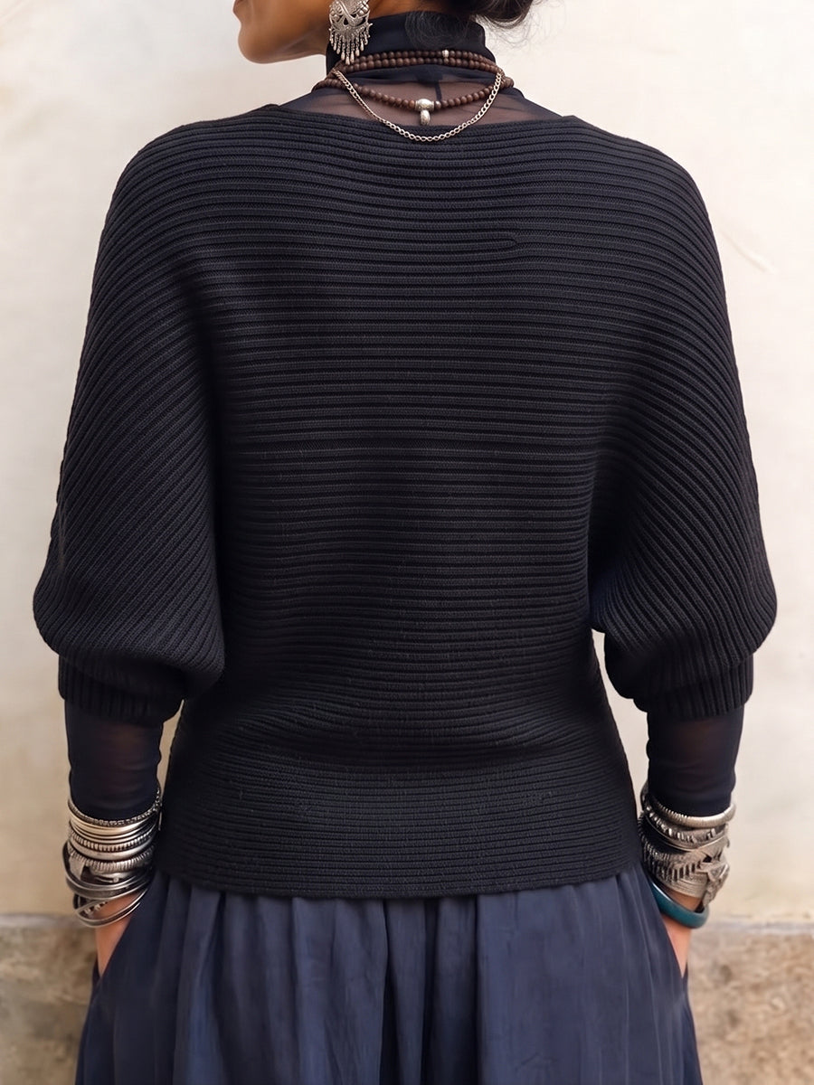 Jersey de punto acanalado artístico con mangas murciélago y tiras entrelazadas